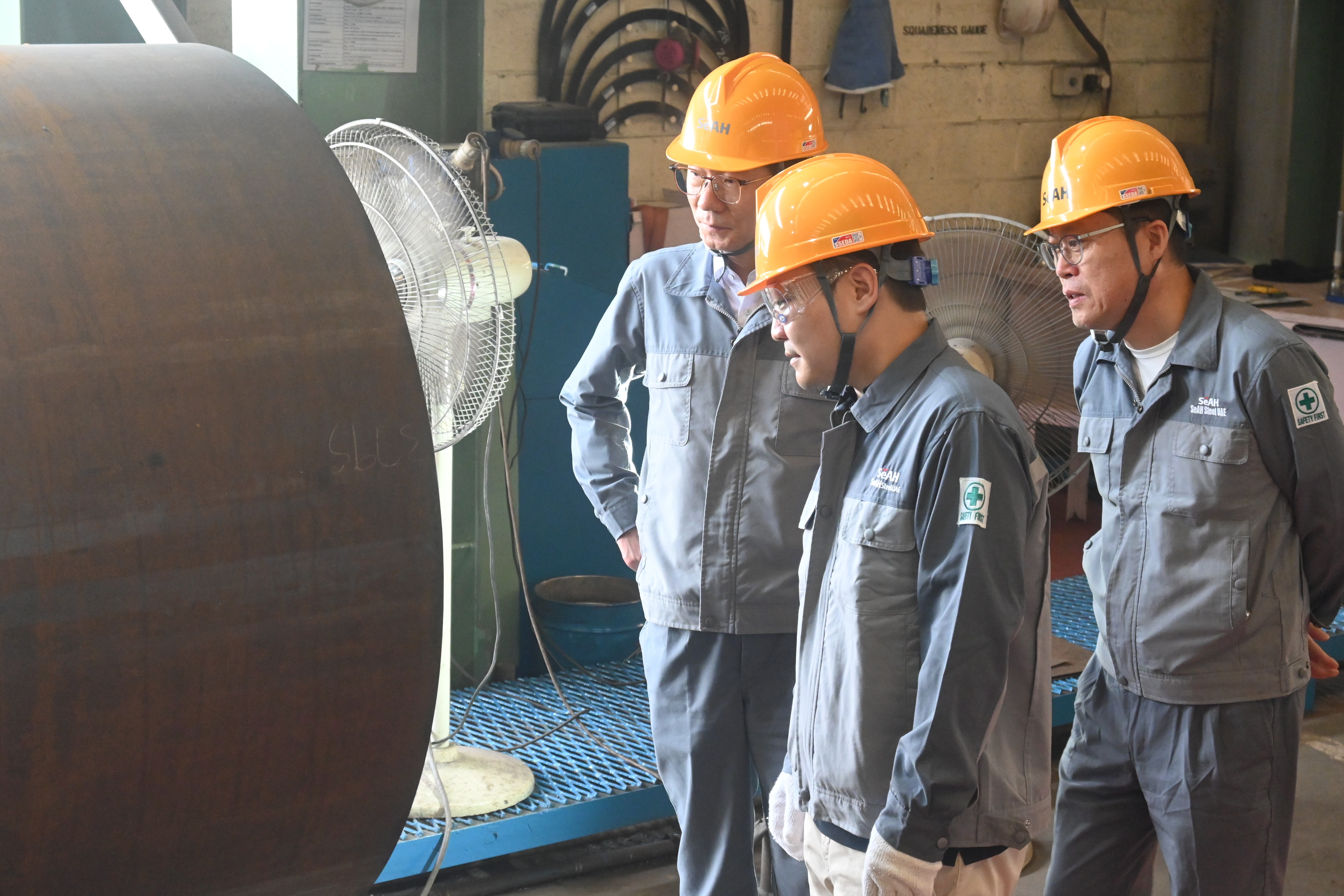 Mr. Lee interacting with production staff